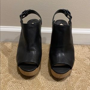 Open toe black leather wedges